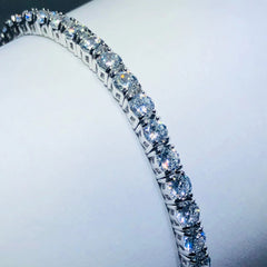 LIV platinum over sterling silver white sapphire prong set tennis bracelet