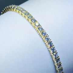 LIV 18k yellow gold over sterling silver white sapphire round cut tennis bracelet