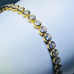 LIV 18k yellow gold over sterling silver white sapphire bezel halo tennis bracelet