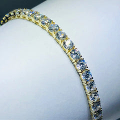 LIV 18k yellow gold over sterling silver white sapphire prong set tennis bracelet