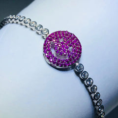 LIV platinum over sterling silver pink & white sapphire happy face tennis bracelet