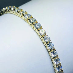 LIV 18k yellow gold over sterling silver white sapphire prong set tennis bracelet