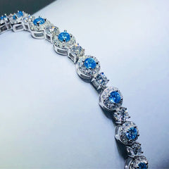 LIV platinum over sterling silver blue & white sapphire tennis bracelet