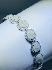 LIV platinum over sterling silver white quartz prong set halo tennis bracelet