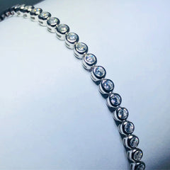 LIV Platinum over sterling silver white sapphire bezel tennis bracelet