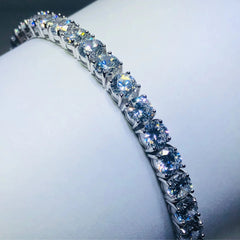 LIV platinum over sterling silver white sapphire prong set tennis bracelet