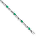 14k White Gold Complete Diamond and Oval Emerald X-design 7.25 inch Bracelet