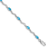 14k White Gold Complete Diamond and Oval Swiss Blue Topaz Wavy Link 7 inch Bracelet