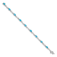 14k White Gold Complete Oval Swiss Blue Topaz and Diamond Infinity Link 7 inch Bracelet