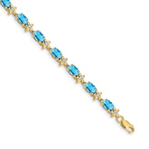 14k Complete Diamond and Oval Swiss Blue Topaz Floral 7 inch Bracelet