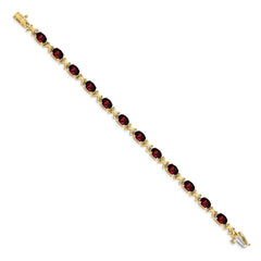 14k Complete 7x5mm Oval Garnet X-design 7 inch Bracelet