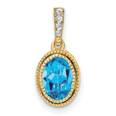 14k Oval Blue Topaz and Diamond Pendant