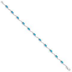 Sterling Silver Rhodium-plated Blue Topaz Bracelet - 6