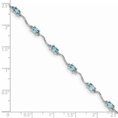 Sterling Silver Rhodium-plated Blue Topaz Bracelet - 6
