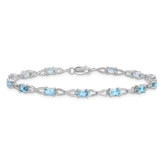 Sterling Silver Rhodium-plated Blue Topaz Bracelet - 9