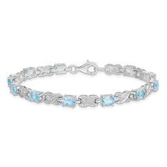 Sterling Silver Rhodium-plated Blue Topaz Bracelet - 11
