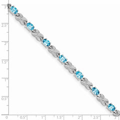 Sterling Silver Rhodium-plated Blue Topaz Bracelet - 11