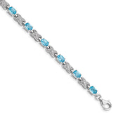 Sterling Silver Rhodium-plated Blue Topaz Bracelet - 11