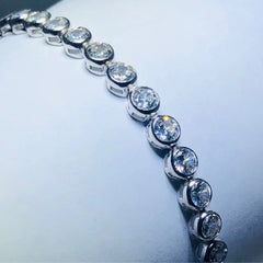 LIV platinum over sterling silver white sapphire halo tennis bracelet