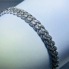 LIV platinum over sterling silver white sapphire cuban link tennis bracelet