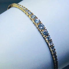 LIV 18k yellow gold over sterling silver white sapphire round cut graduated tennis bracelet