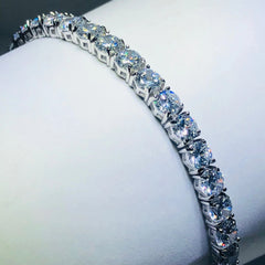 LIV platinum over sterling silver white sapphire prong set tennis bracelet