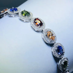 LIV platinum over sterling silver rainbow sapphire halo tennis bracelet