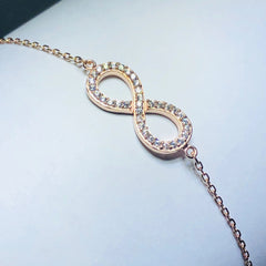 LIV 18k rose gold over sterling silver white sapphire infinity bracelet