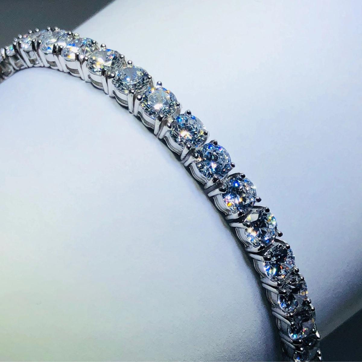 LIV platinum over sterling silver white sapphire tennis bracelet