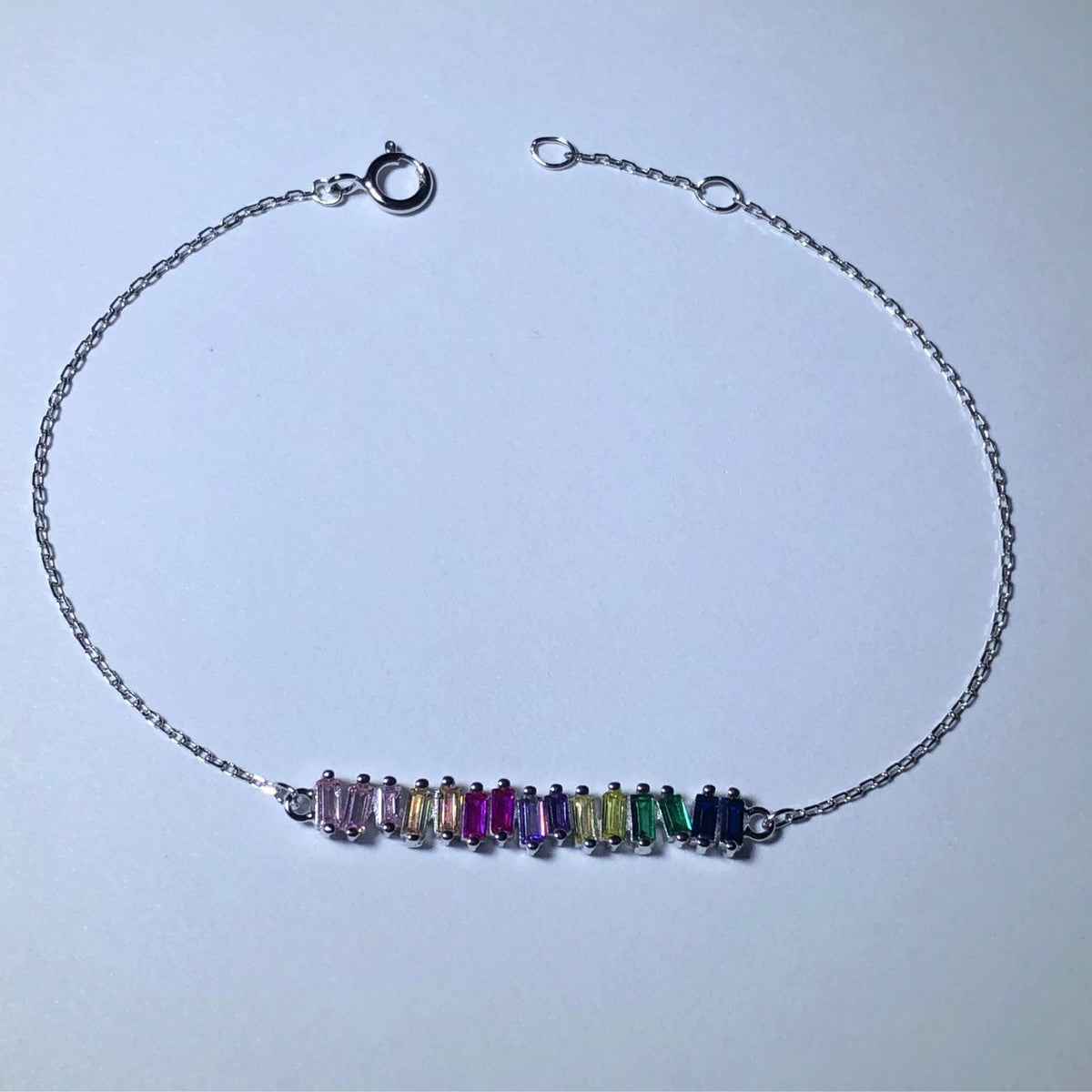 LIV platinum over sterling silver with lab created rainbow sapphires 7” Length
