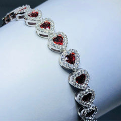 LIV platinum over sterling silver red & white sapphire pave heart tennis bracelet