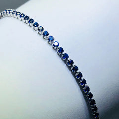 LIV platinum over sterling silver blue sapphire thin tennis bracelet