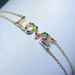 LIV 18k yellow gold over sterling silver pave rainbow love bracelet