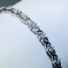 LIV platinum over sterling silver white sapphire xoxo tennis bracelet