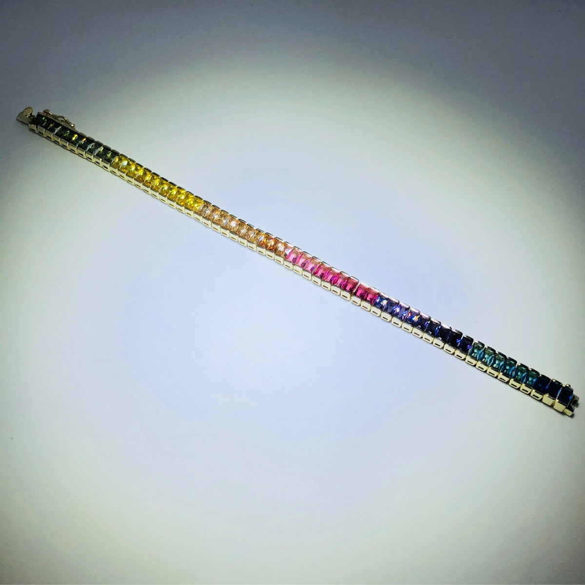 LIV 18k yellow gold over sterling silver rainbow sapphire tennis bracelet