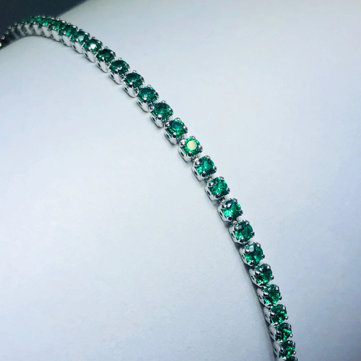 LIV Platinum over sterling silver green sapphire tennis bracelet bracelet