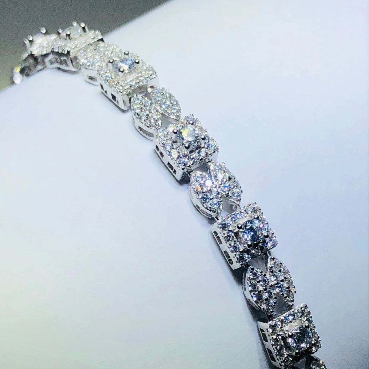 LIV platinum over sterling silver white sapphire pave tennis bracelet