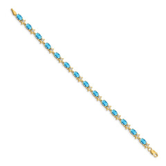 14k Complete Diamond and Oval Swiss Blue Topaz Floral 7 inch Bracelet