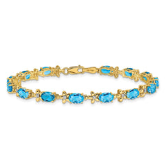 14k Complete Diamond and Oval Swiss Blue Topaz Floral 7 inch Bracelet