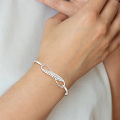 Sterling Silver Infinity w/Feather Bangle Bracelet