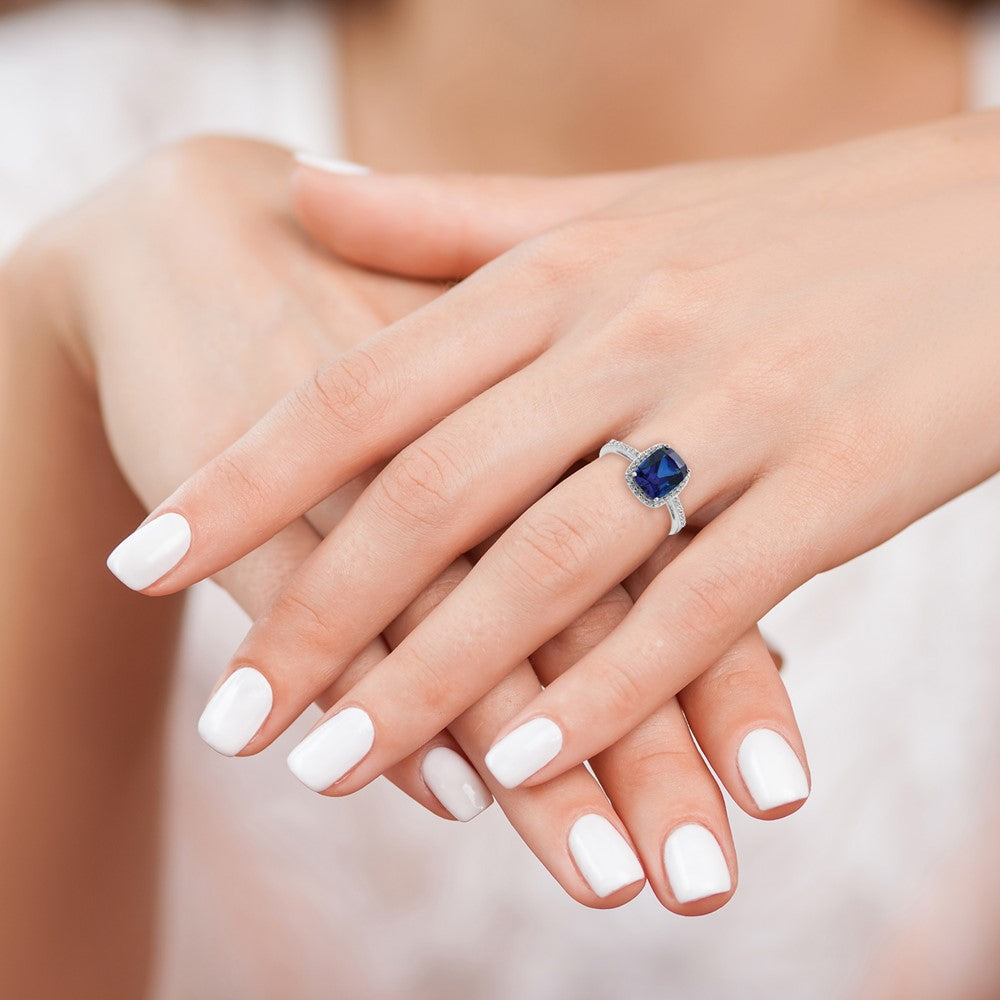 Sterling Silver Rhodium-plated Created Blue Sapphire and CZ Ring