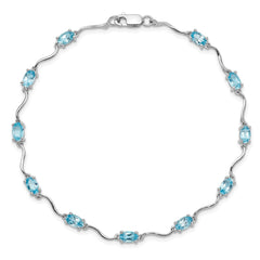 Sterling Silver Rhodium-plated Blue Topaz Bracelet - 6