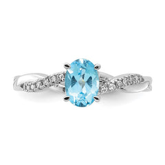 14K White Gold Oval Blue Topaz and Diamond Ring