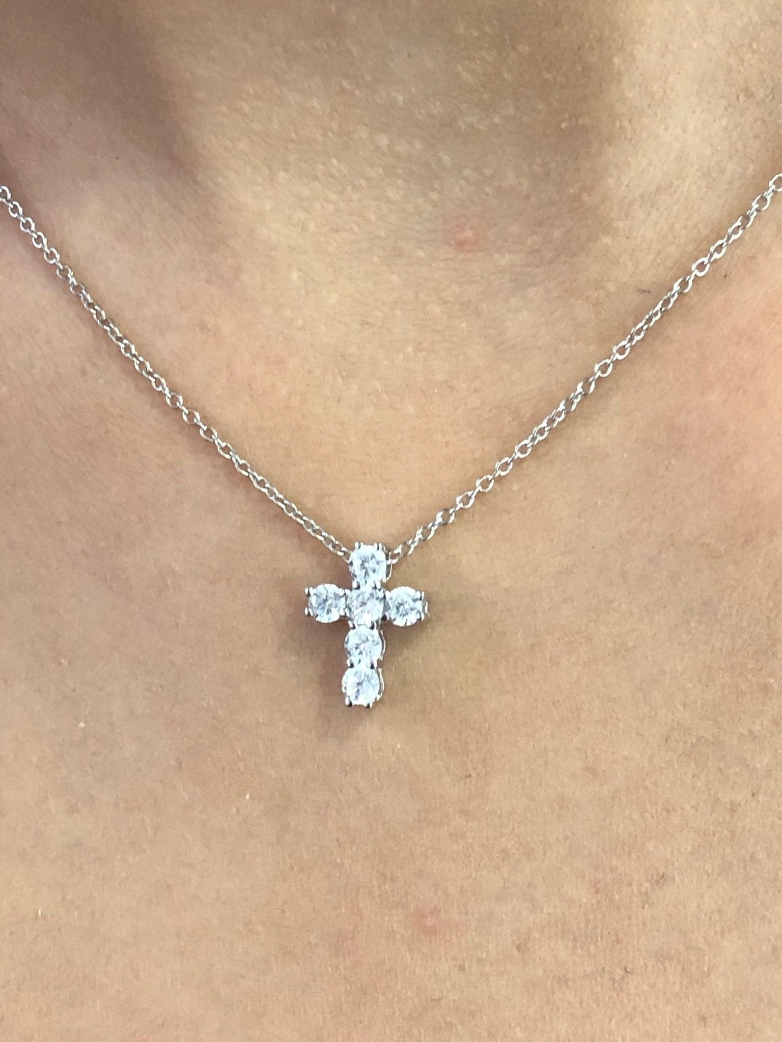 LIV Platinum plated sterling silver mini cross necklace with simulated diamonds