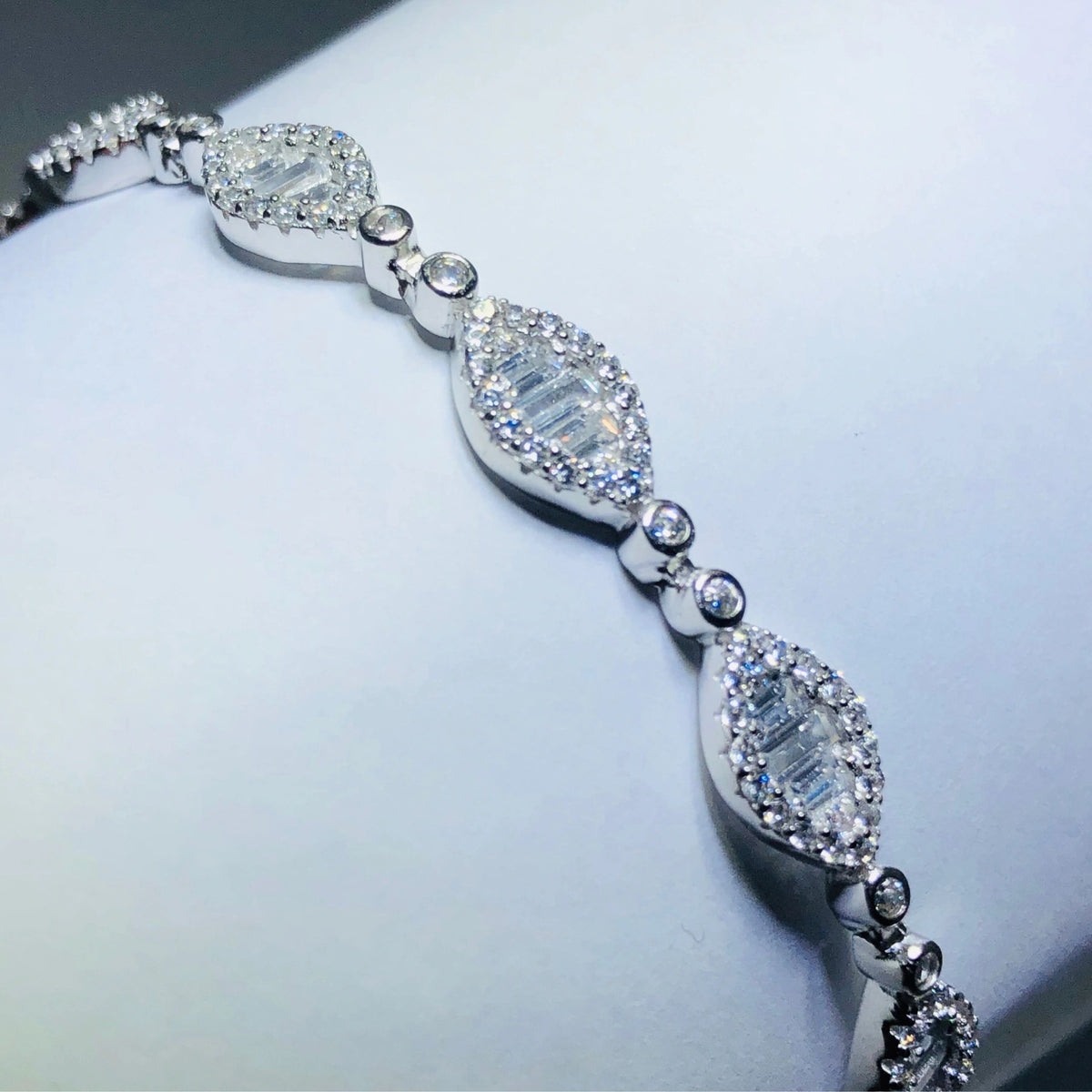 LIV platinum over sterling silver white sapphire baguette tennis bracelet