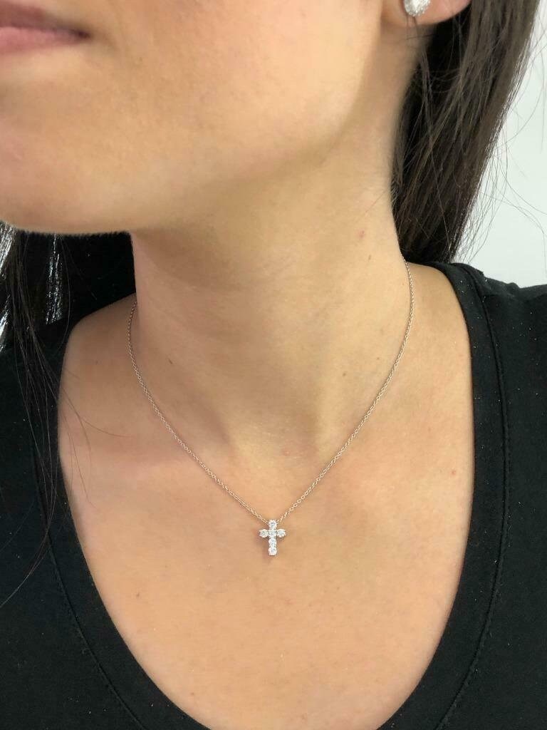 LIV Platinum Sterling Silver Simulated White Sapphire Shared Prong Mini Cross Necklace